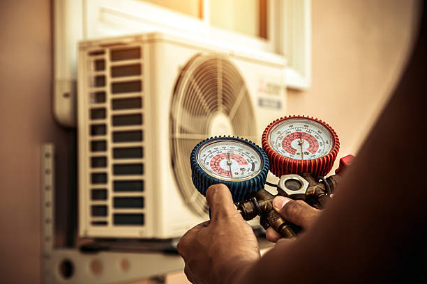 Professional Air Conditioning Service technician working in Webster, MN